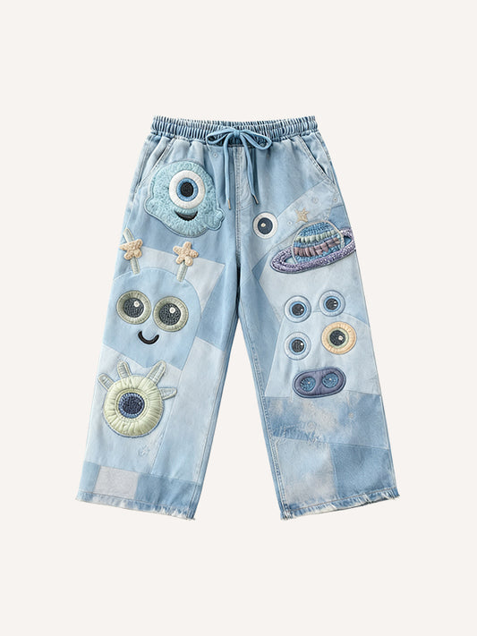 Cute patchwork one-eyed monster fashion trousers
