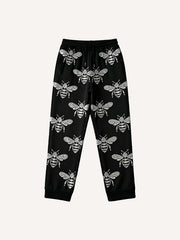 In love whoever lies gets stung on the tongue by a bee Printed trousers