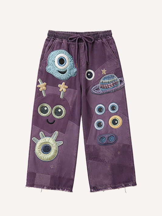 Cute patchwork one-eyed monster fashion trousers
