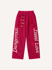 Do not touch the dangerous woman is red lips or the corduroy printed trousers