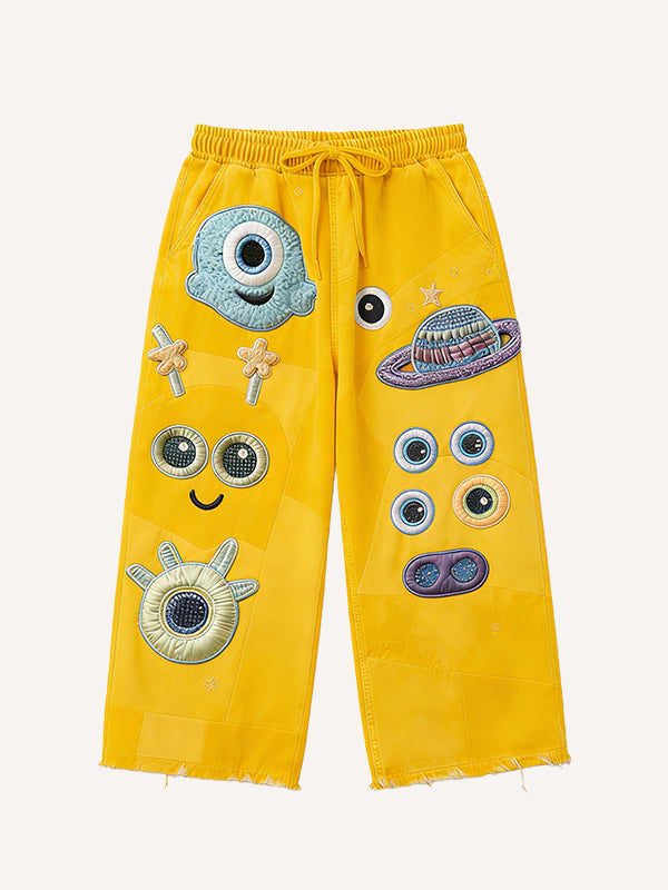 Cute patchwork one-eyed monster fashion trousers