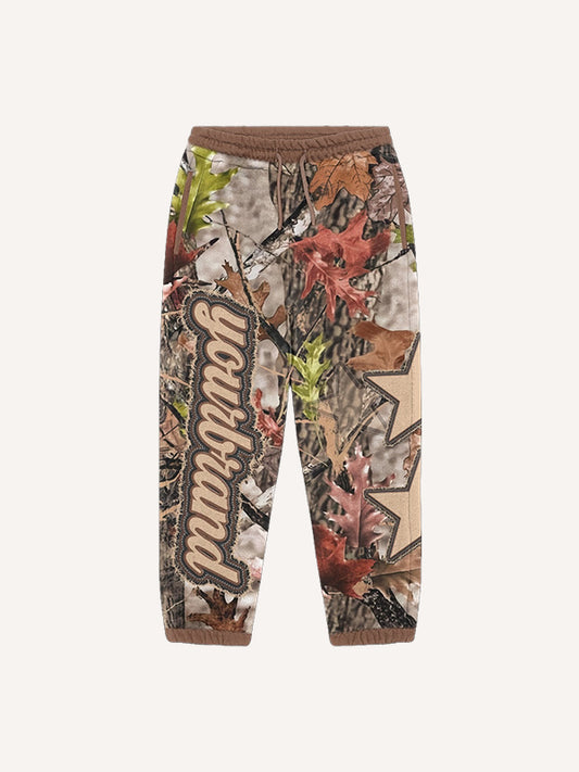 Appliquéd patchwork weekend print rap Pants